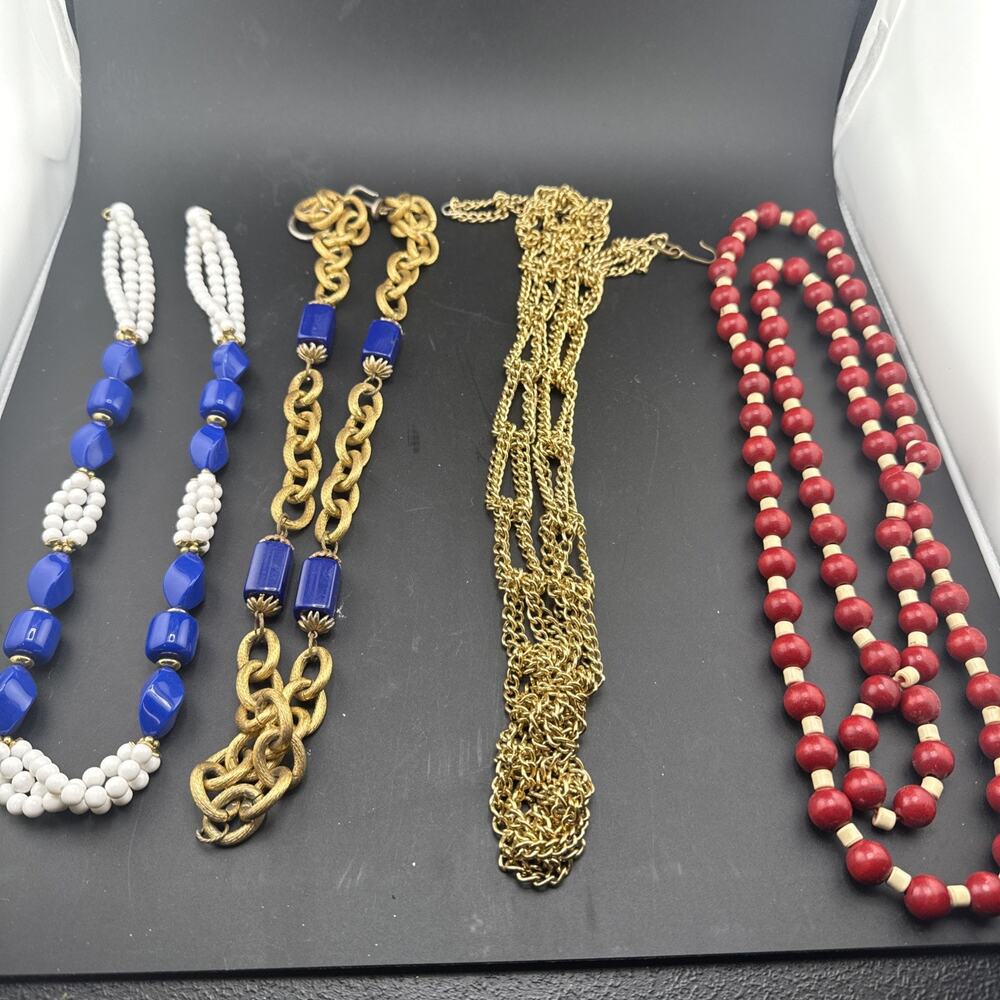 Lot Of 4 Fashion Necklaces - Gold Tone, Plastic, And Wood